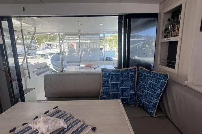 Rockin U Yacht Photos Pics Interior of 2020 Leopard 43 Powercat with cozy seating and nautical decor.