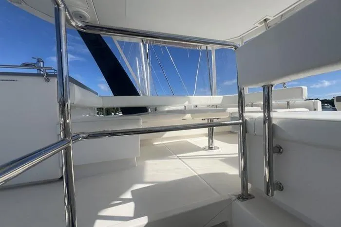 Rockin U Yacht Photos Pics Leopard 43 Powercat 2020 yacht deck with stainless steel railings and seating.
