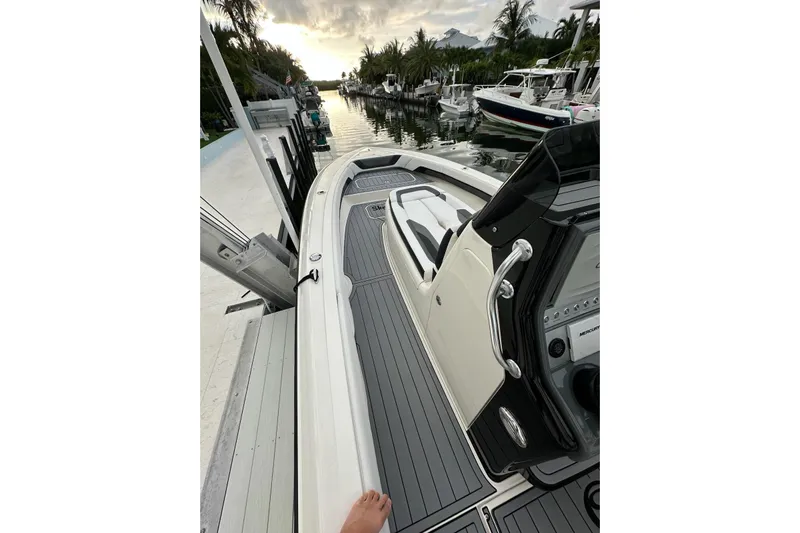  Yacht Photos Pics 2021 ShearWater 270 Carolina Flare boat docked at a scenic marina.