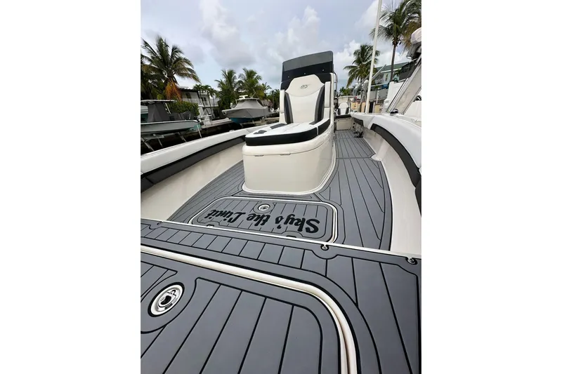  Yacht Photos Pics 2021 ShearWater 270 Carolina Flare boat with sleek deck design and comfortable seating.