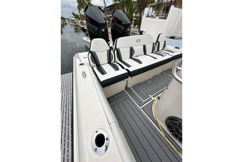  Yacht Photos Pics 2021 ShearWater 270 Carolina Flare boat interior with dual engines and sleek seating.
