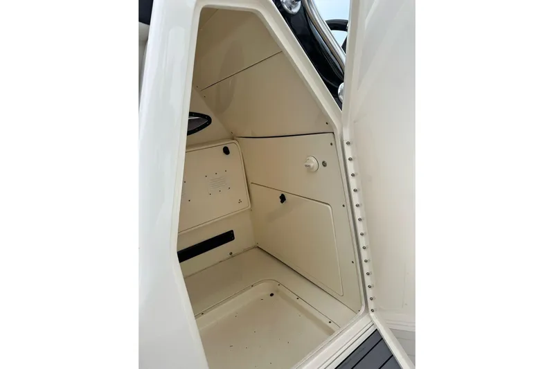  Yacht Photos Pics Interior cabin of 2021 ShearWater 270 Carolina Flare boat, featuring storage compartments.