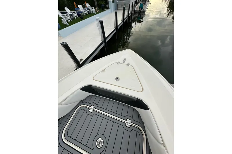  Yacht Photos Pics Bow view of 2021 ShearWater 270 Carolina Flare boat docked by a pier.