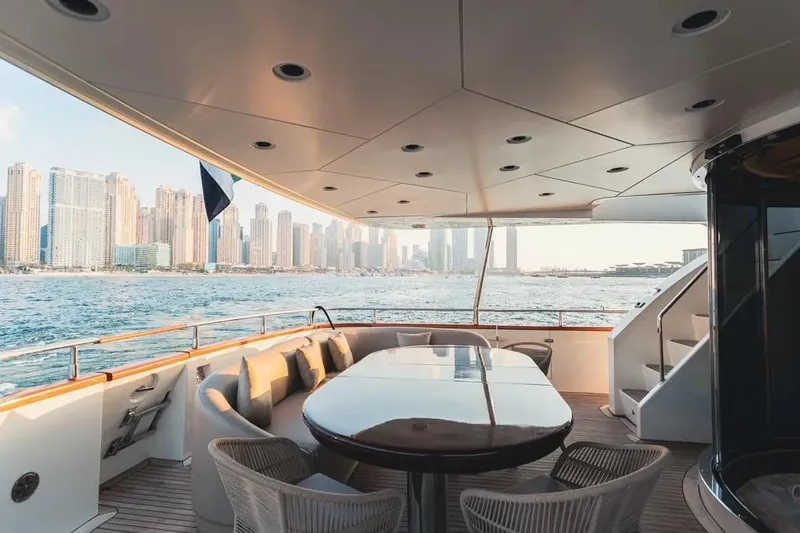  Yacht Photos Pics Luxurious 2004 Azimut 100 Jumbo yacht deck with city skyline view.