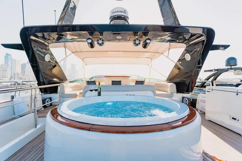  Yacht Photos Pics Luxurious 2004 Azimut 100 Jumbo yacht with jacuzzi and elegant seating area.