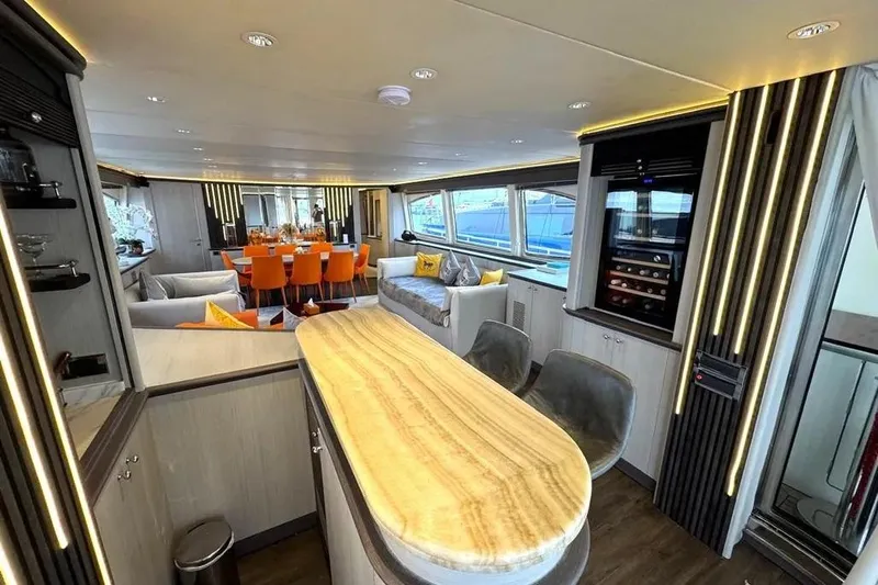  Yacht Photos Pics Luxurious interior of 2004 Azimut 100 Jumbo yacht with elegant dining area and modern design.