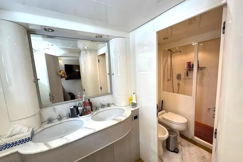  Yacht Photos Pics Luxurious bathroom in 2004 Azimut 100 Jumbo yacht with dual sinks and shower.