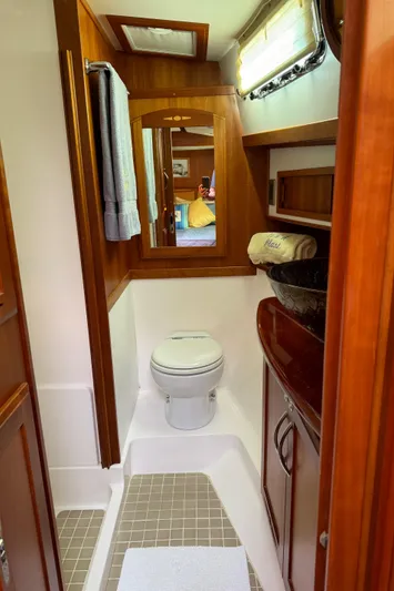 Its A Blast Yacht Photos Pics 2010 Sabre 52 Salon Express bathroom with wood accents and modern fixtures.