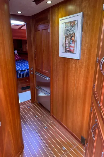 Its A Blast Yacht Photos Pics Interior of 2010 Sabre 52 Salon Express yacht with wooden paneling and cozy cabin.