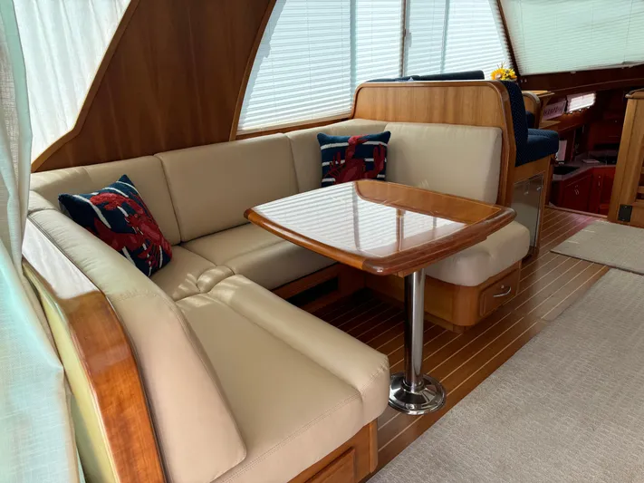 Its A Blast Yacht Photos Pics Luxurious interior of 2010 Sabre 52 Salon Express yacht with elegant seating and table.