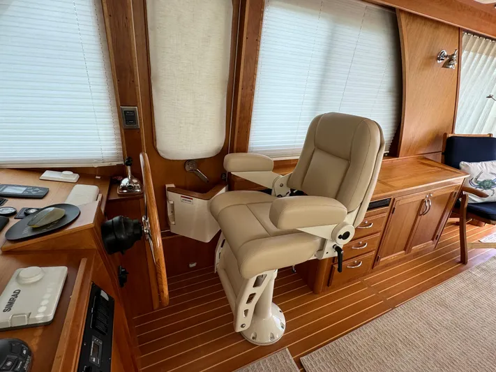 Its A Blast Yacht Photos Pics Luxurious helm station of 2010 Sabre 52 Salon Express with plush captain's chair.