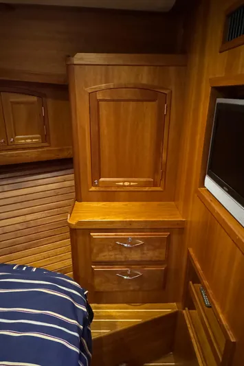 Its A Blast Yacht Photos Pics 2010 Sabre 52 Salon Express cabin with wooden cabinetry and built-in TV.