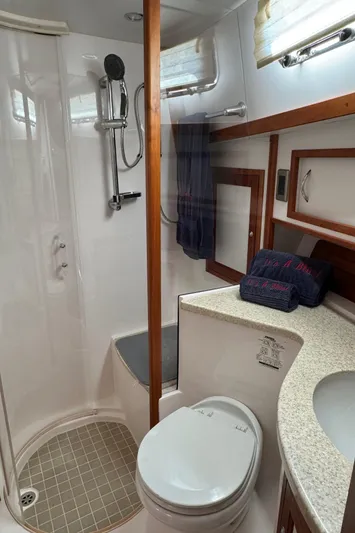 Its A Blast Yacht Photos Pics 2010 Sabre 52 Salon Express bathroom with shower, toilet, and sink.