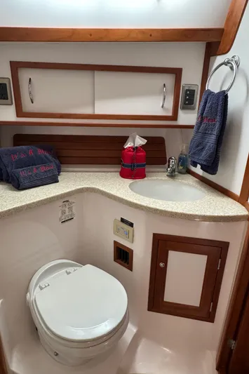 Its A Blast Yacht Photos Pics 2010 Sabre 52 Salon Express bathroom with modern fixtures and wooden accents.