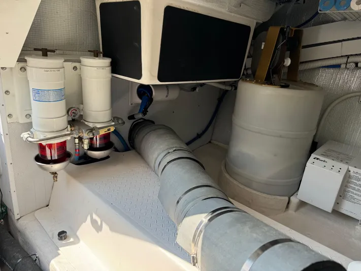 Its A Blast Yacht Photos Pics Engine room of 2010 Sabre 52 Salon Express with filters and piping.