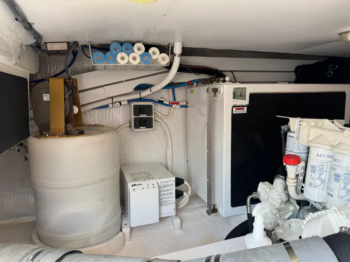 Its A Blast Yacht Photos Pics Engine room of 2010 Sabre 52 Salon Express with mechanical equipment and storage.