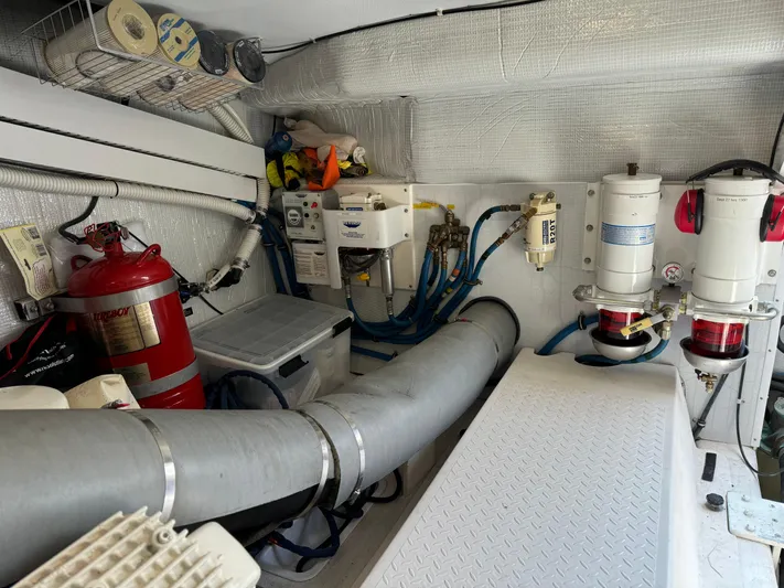 Its A Blast Yacht Photos Pics Engine room of 2010 Sabre 52 Salon Express with equipment and fire extinguisher.