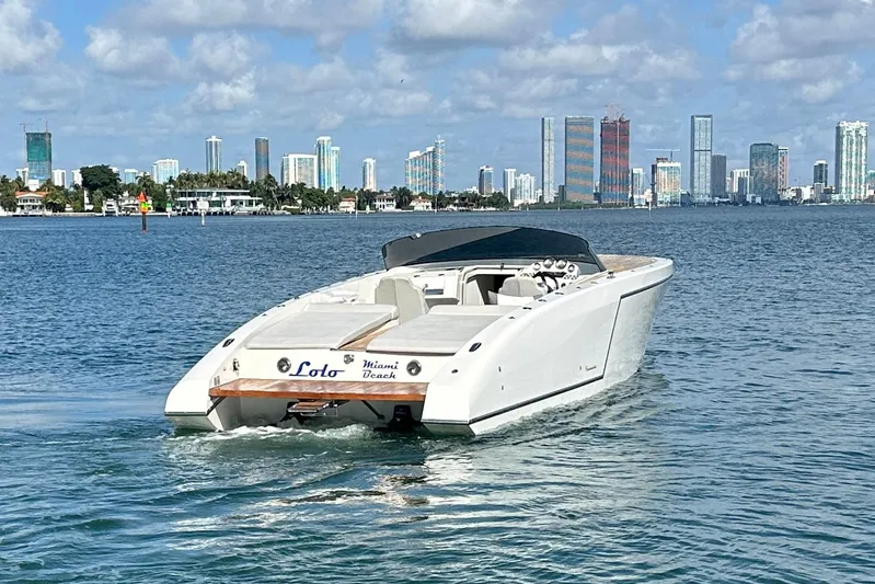 Lolo Yacht Photos Pics 2020 Frauscher 1017 GT boat cruising near Miami skyline on a sunny day.