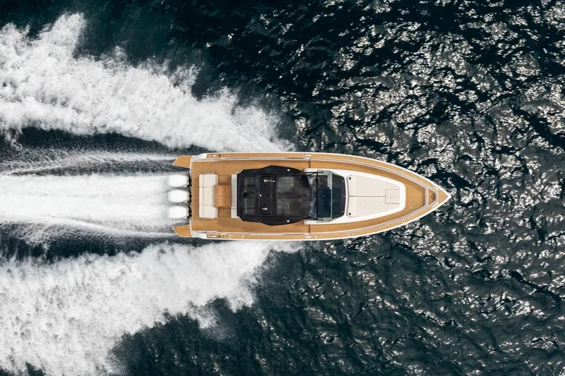 Vector 9 Yacht Photos Pics Top view of a 2021 Pardo Yachts 38 cruising on the ocean.