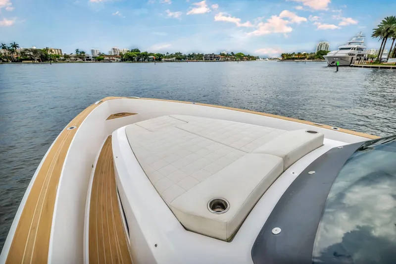 Vector 9 Yacht Photos Pics Pardo Yachts 38 (2021) with luxurious deck, cruising on a scenic waterway.