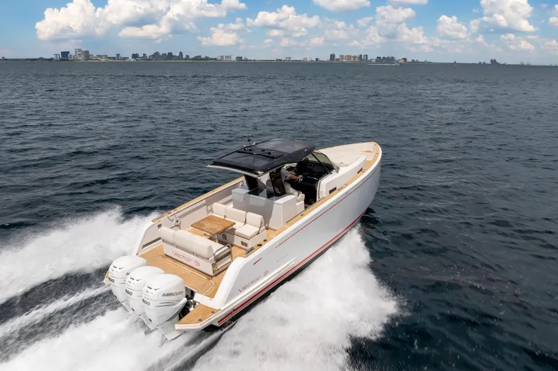 Vector 9 Yacht Photos Pics 2021 Pardo Yachts 38 cruising on open water under a clear sky.