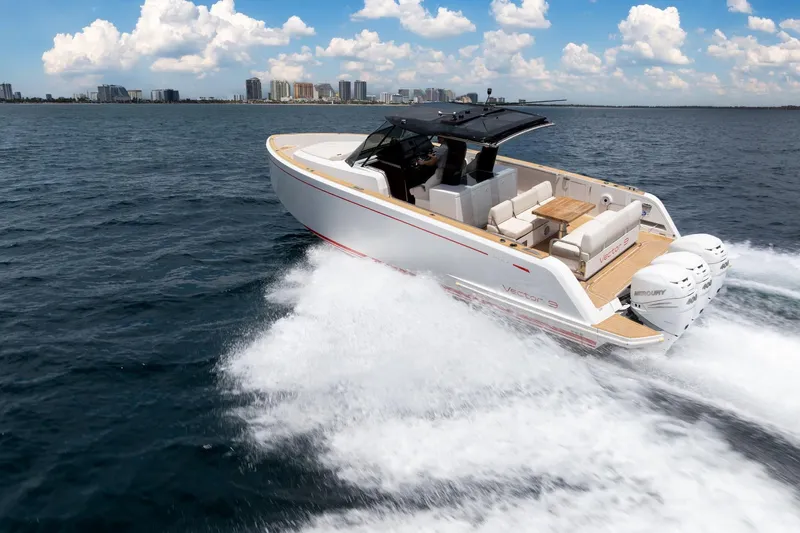Vector 9 Yacht Photos Pics 2021 Pardo Yachts 38 cruising on open water, showcasing sleek design and powerful engines.
