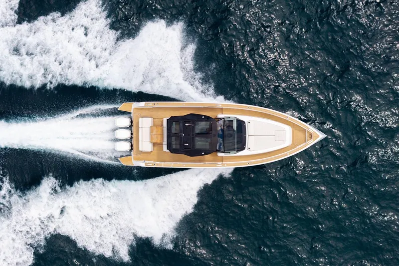 Vector 9 Yacht Photos Pics Aerial view of 2021 Pardo Yachts 38 cruising on open water.