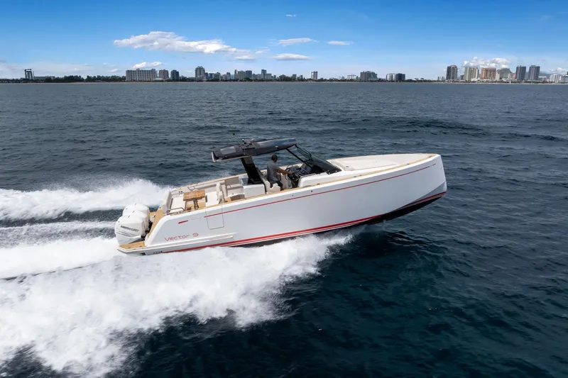 Vector 9 Yacht Photos Pics 2021 Pardo Yachts 38 cruising on open water near city skyline.