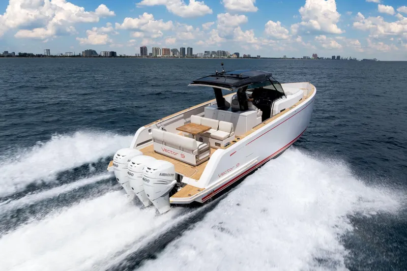Vector 9 Yacht Photos Pics 2021 Pardo Yachts 38 cruising on open water, showcasing sleek design and powerful engines.