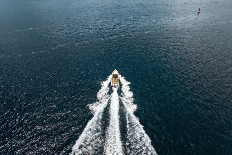 Vector 9 Yacht Photos Pics Aerial view of 2021 Pardo Yachts 38 cruising on open water.