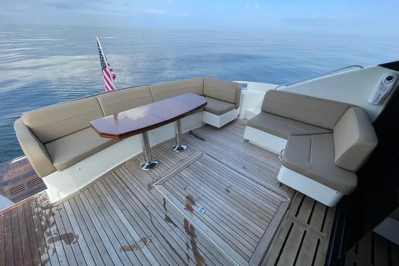Special K Yacht Photos Pics Luxurious 2016 Sea Ray L650 yacht deck with seating and ocean view.