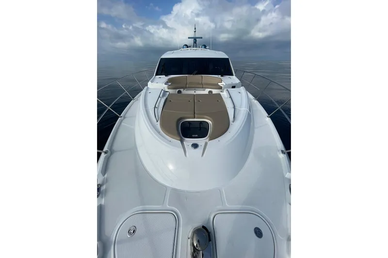 Special K Yacht Photos Pics 2016 Sea Ray L650 yacht on calm waters under cloudy sky.