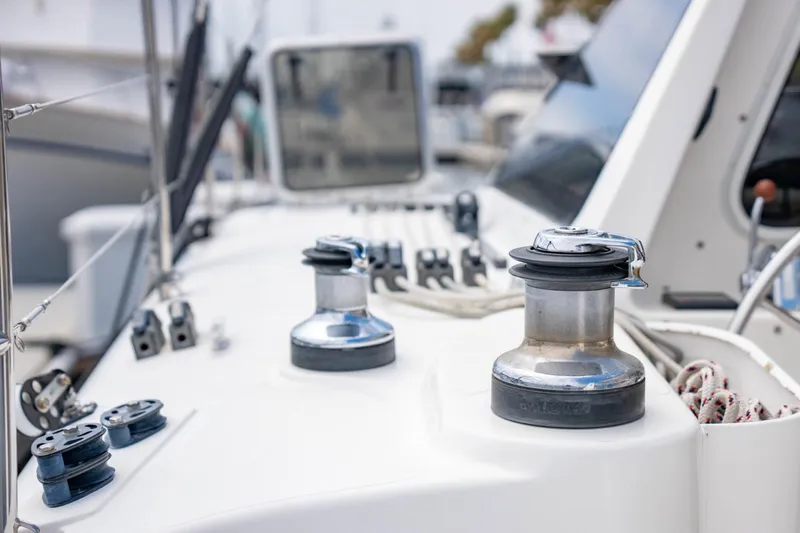 Making Waves Yacht Photos Pics Close-up of 2006 Seawind 1160 sailboat deck with winches and rigging.