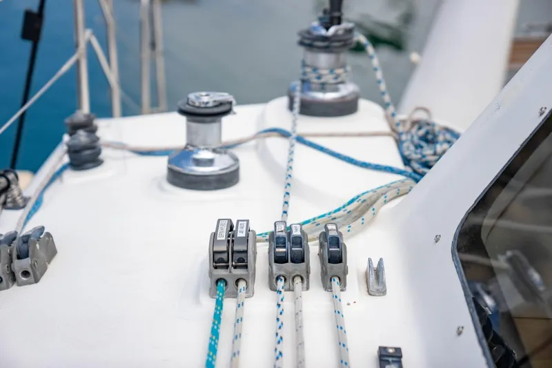 Making Waves Yacht Photos Pics Close-up of 2006 Seawind 1160 sailboat deck with ropes and winches.