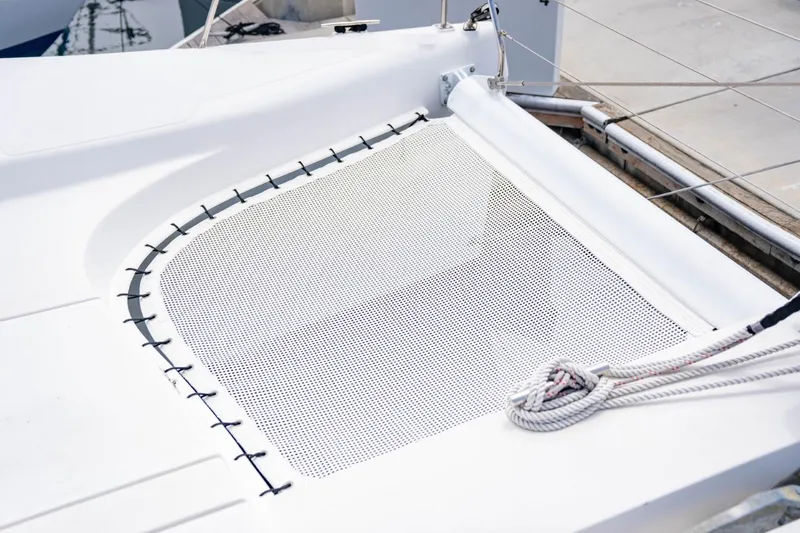 Making Waves Yacht Photos Pics Seawind 1160 catamaran deck with netting and ropes, 2006 model.
