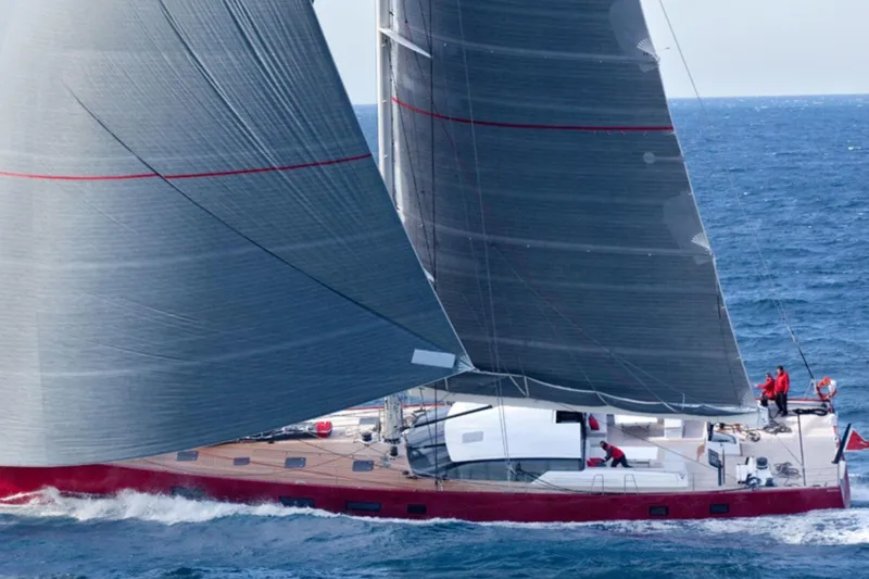 Nomad IV Yacht Photos Pics Sailing yacht Maxi Dolphin Cruiser-Racer 2013 navigating ocean waters with full sails.