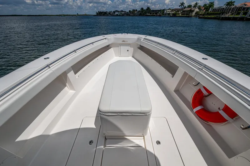  Yacht Photos Pics 2015 Invincible 42 Open Fisherman boat deck with seating and life preserver.