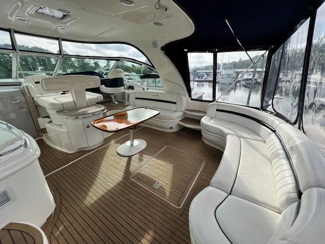  Yacht Photos Pics Luxurious 2005 Sea Ray 500 Sundancer yacht interior with elegant seating and wooden flooring.