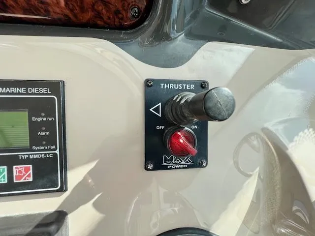  Yacht Photos Pics Control panel of a 2005 Sea Ray 500 Sundancer with thruster switch and marine diesel display.