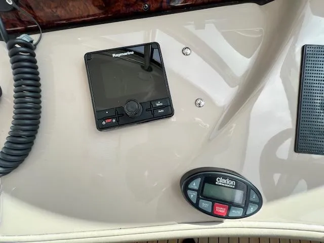  Yacht Photos Pics Control panel of a 2005 Sea Ray 500 Sundancer with Raymarine and Clarion devices.