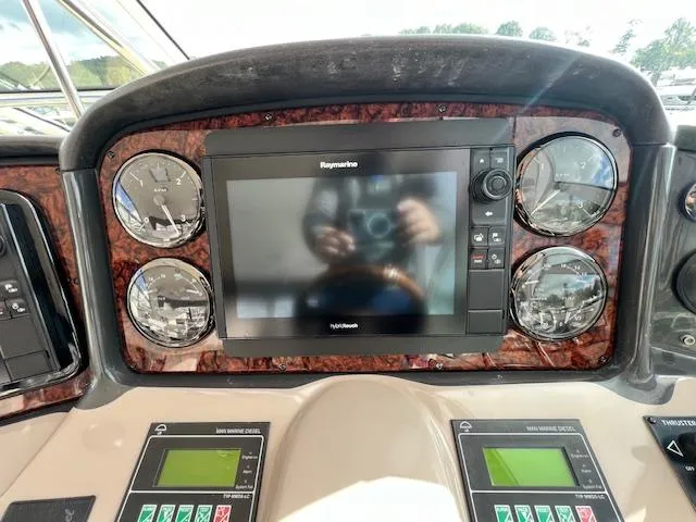  Yacht Photos Pics Dashboard of 2005 Sea Ray 500 Sundancer with Raymarine navigation system and gauges.