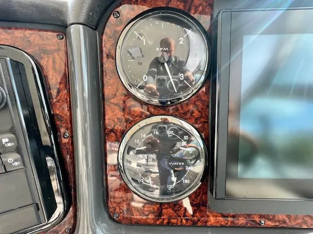  Yacht Photos Pics Dashboard of 2005 Sea Ray 500 Sundancer with RPM and water gauges.