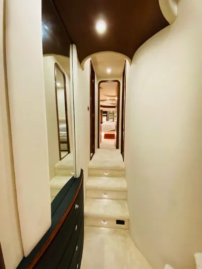  Yacht Photos Pics Interior hallway of a 2006 Azimut 68 yacht, featuring elegant design and lighting.