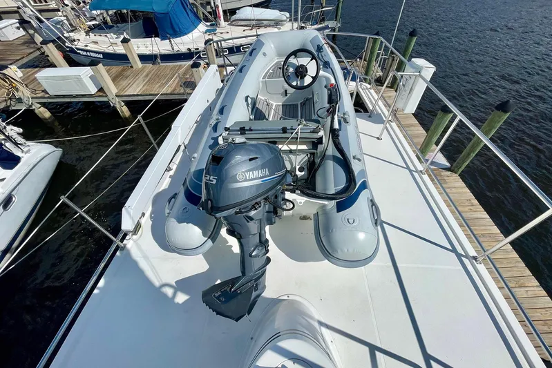 Slainte II Yacht Photos Pics Inflatable boat with Yamaha motor on 2008 Nordic Tug 42 deck, docked at marina.