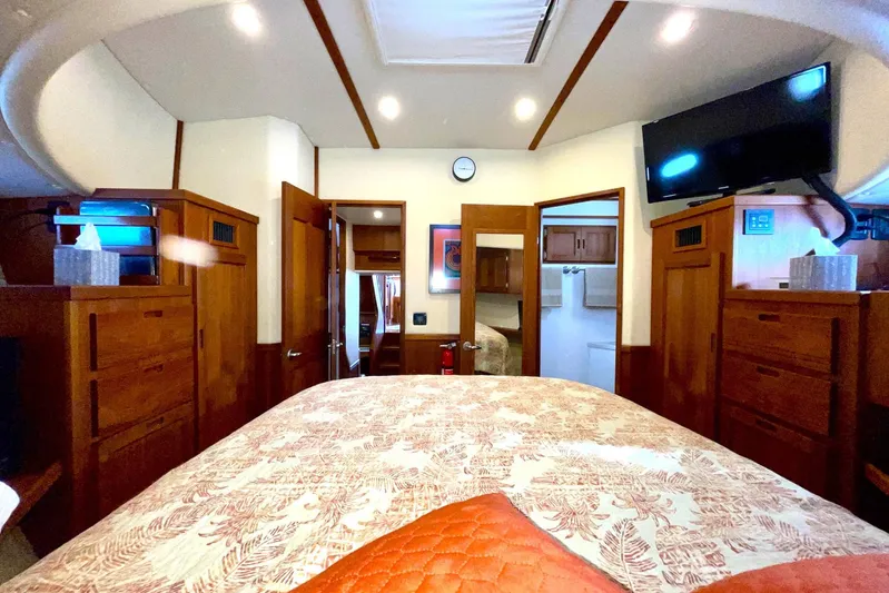 Slainte II Yacht Photos Pics Luxurious 2008 Nordic Tug 42 interior cabin with wood furnishings and modern amenities.