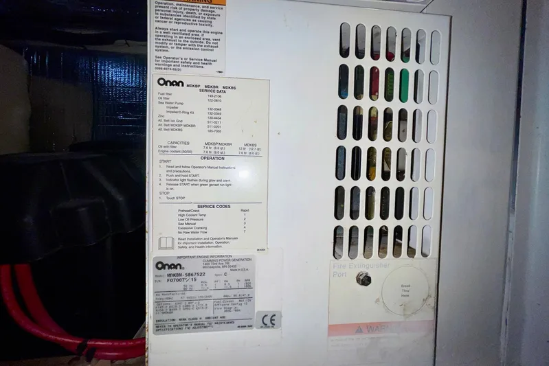 Slainte II Yacht Photos Pics Onan generator panel in a 2008 Nordic Tug 42 boat engine room.