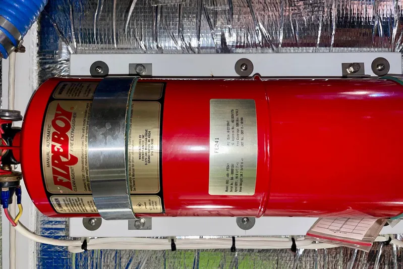 Slainte II Yacht Photos Pics Red Fireboy fire extinguisher installed on a 2008 Nordic Tug 42 boat.