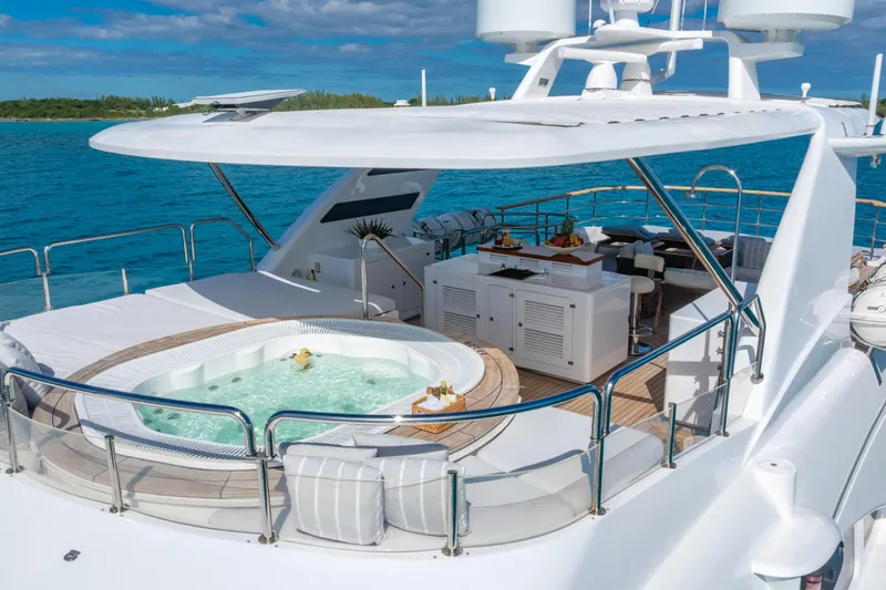 Allora Yacht Photos Pics Luxurious 2011 Benetti Classic 121 yacht with jacuzzi and outdoor lounge area.