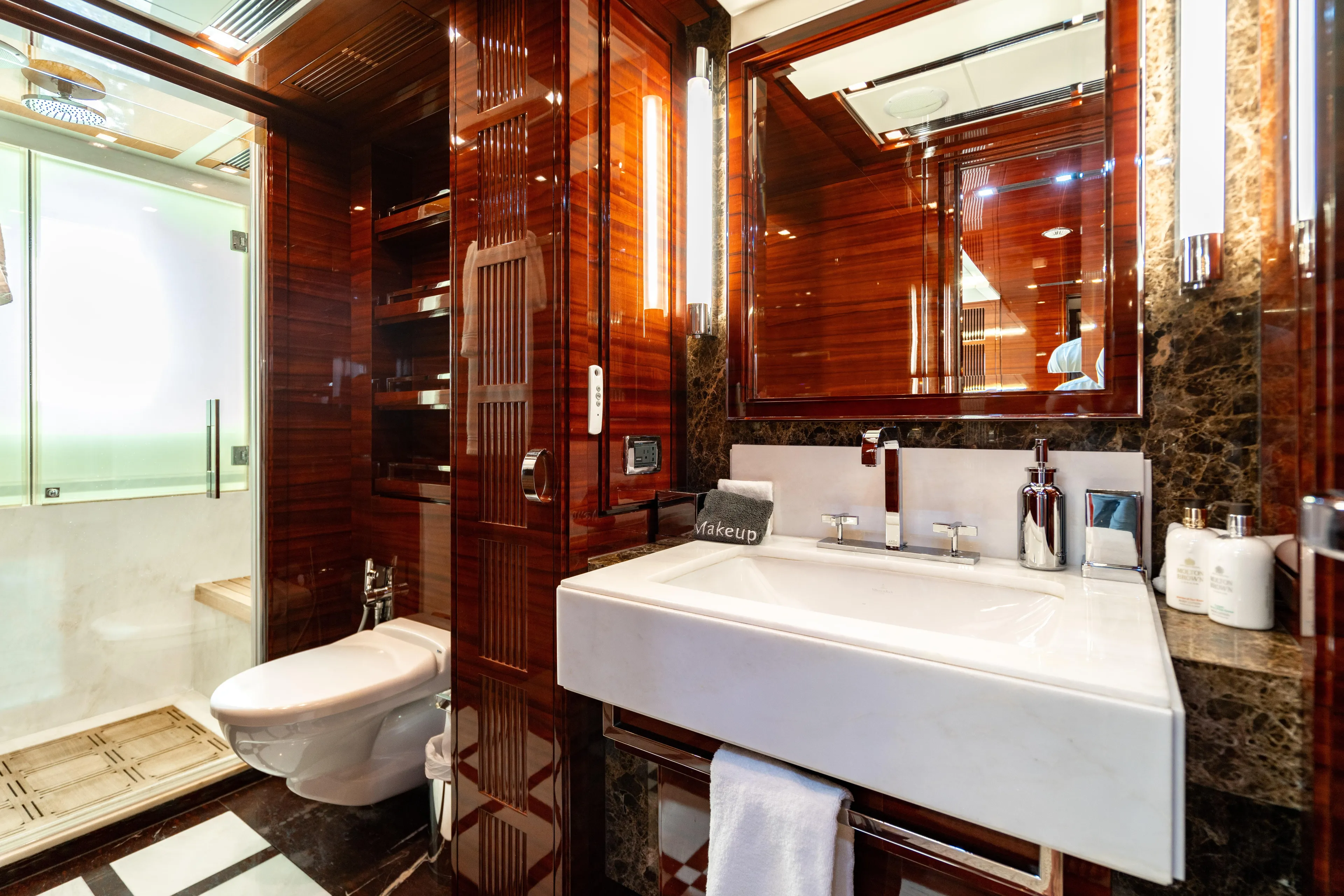 Allora Yacht Photos Pics Luxurious bathroom on 2011 Benetti Classic 121 yacht with elegant wood and marble finishes.