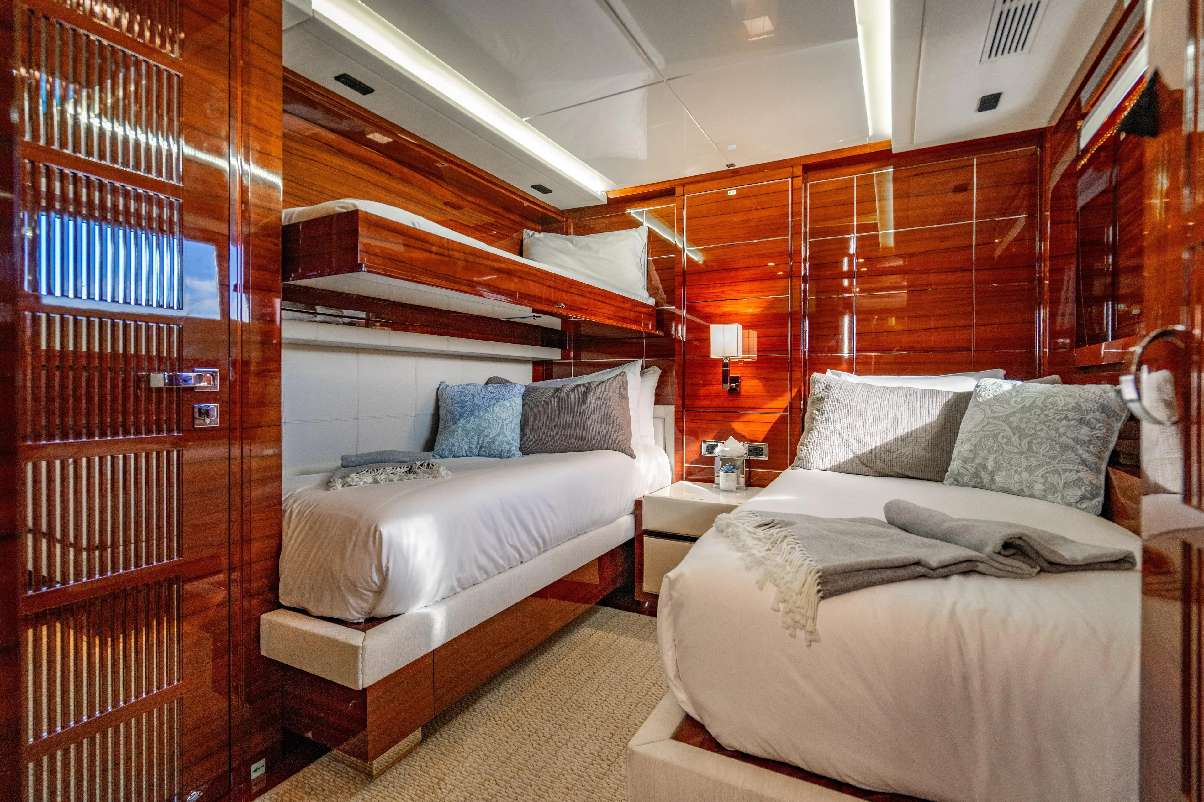 Allora Yacht Photos Pics Luxurious cabin interior of 2011 Benetti Classic 121 yacht with elegant wood finishes.